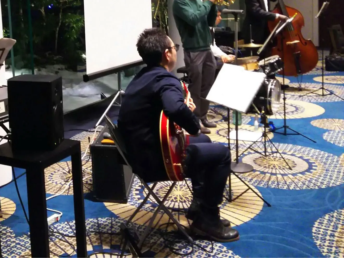 Yuta Konishi playing guitar